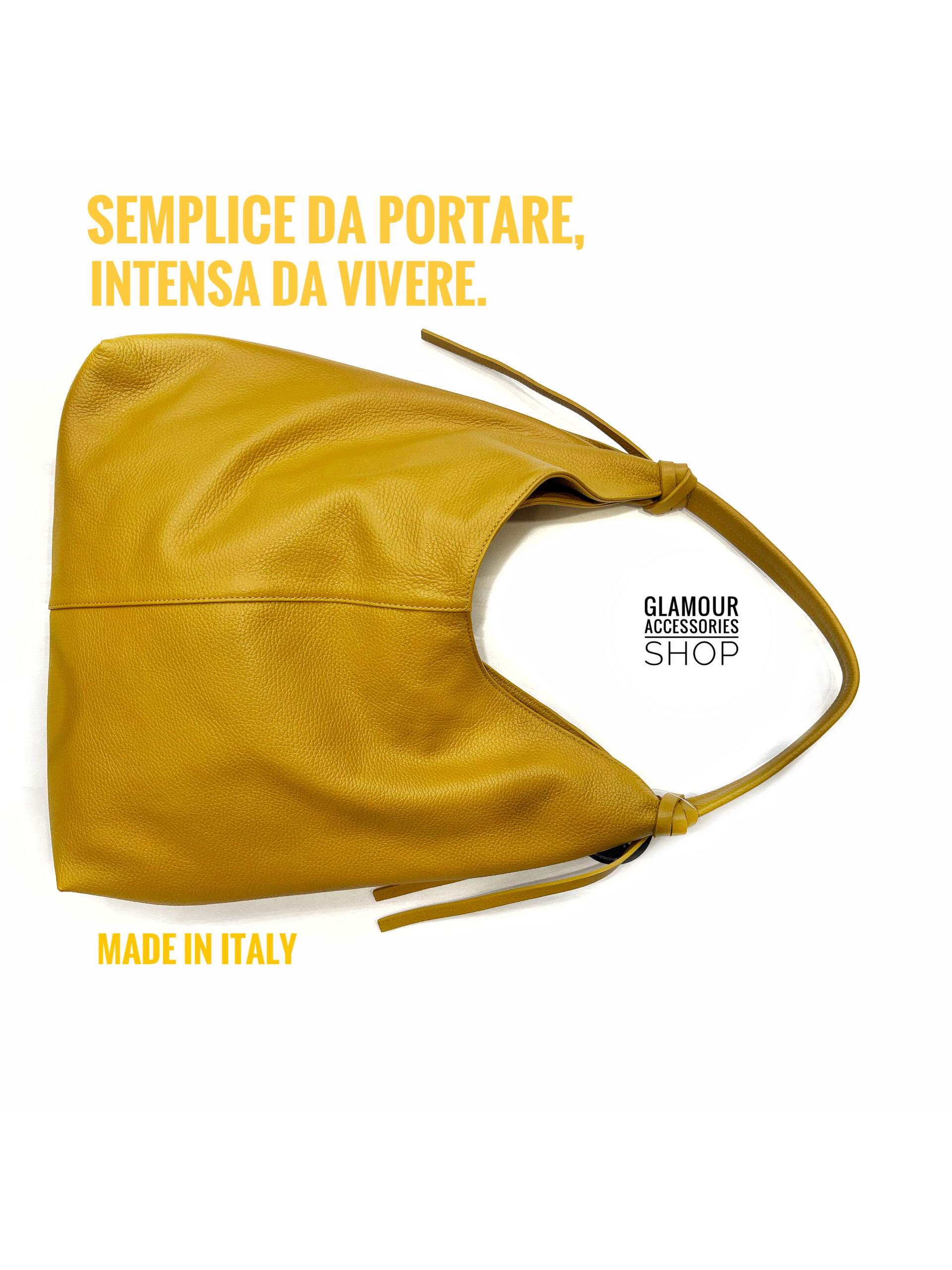 Borsa sacca donna in vera pelle Made in Italy, colore senape , con chiusura zip e dettaglio lacci al manico.