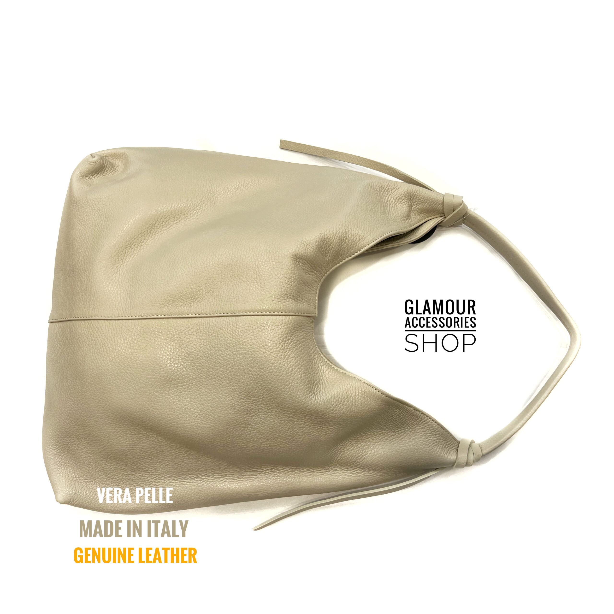 Borsa sacca donna in vera pelle Made in Italy, colore latte, con chiusura zip e dettaglio lacci al manico.