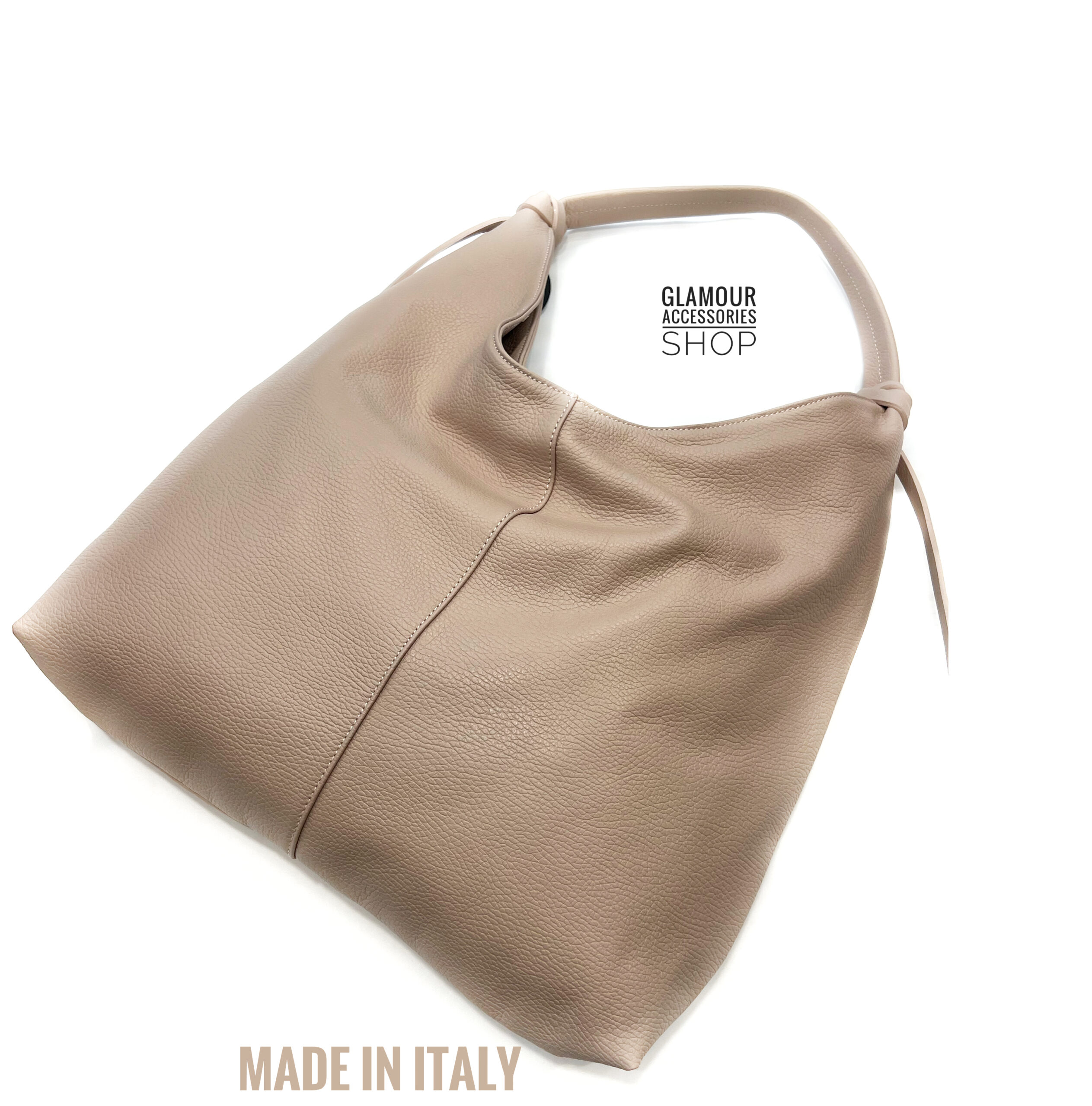 Borsa sacca donna in vera pelle Made in Italy, colore rosa antico, con chiusura zip e dettaglio lacci al manico.